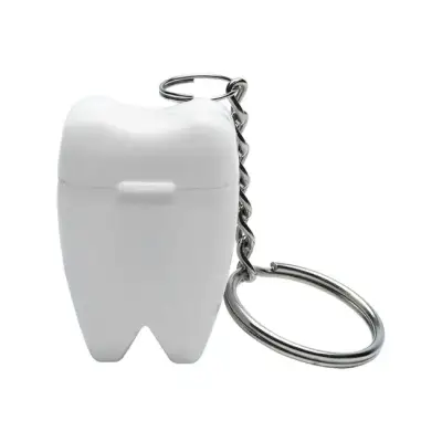 Brelok w kształcie zęba z nicią dentystyczną